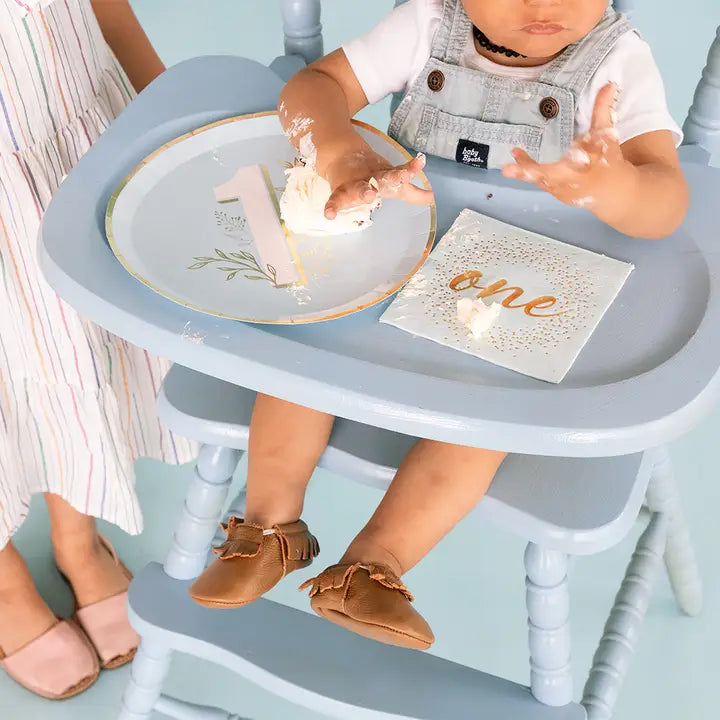 Blue milestone dinner plate with gold one design for first birthday from Parte Haus party supply store in Bethesda Maryland