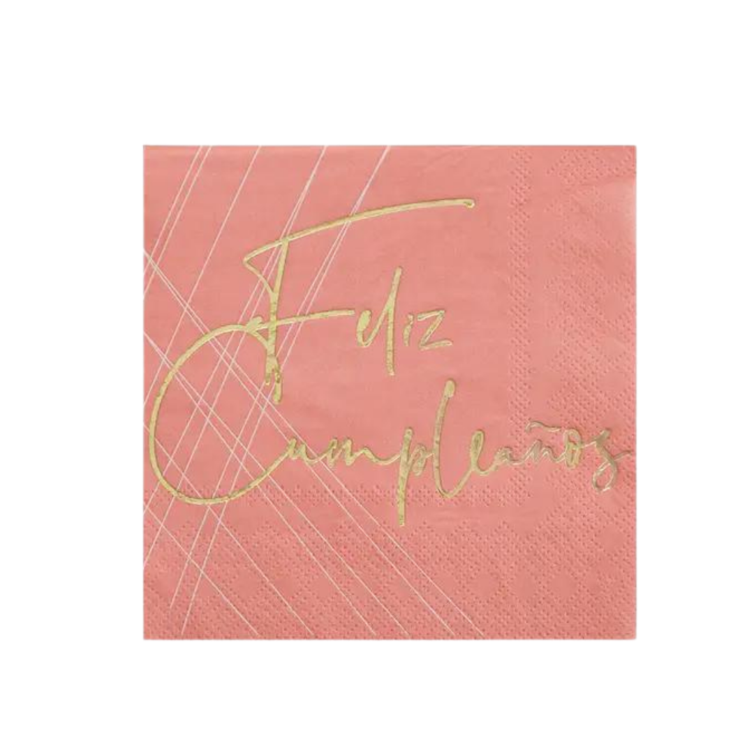 Pink birthday cocktail napkin with gold feliz cumpleaños text from Parte Haus party supply store in Bethesda MD