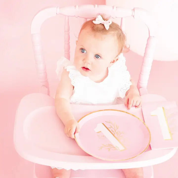 Pink milestone dinner plate with gold one design for first birthday princess theme from Parte Haus party supply store in Bethesda MD