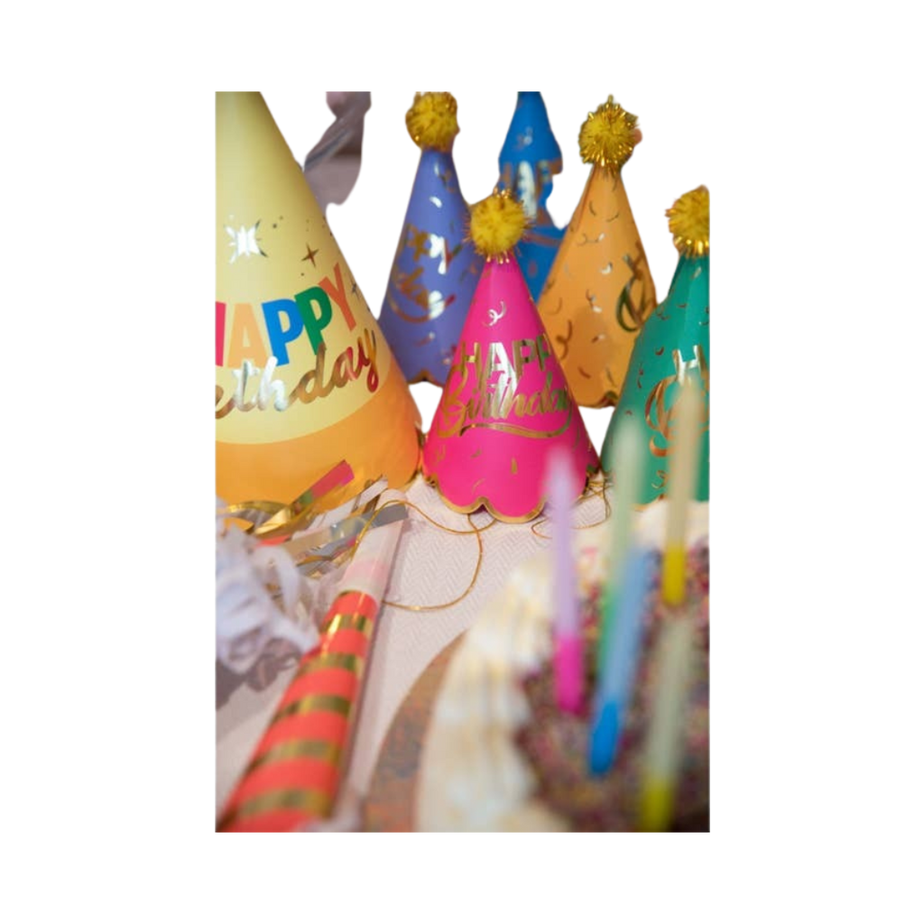 Colorful mini birthday hats with gold accents and candles birthday theme from Parte Haus party supply store in Bethesda MD
