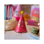 Pink mini happy birthday party hat with gold pom and cake for birthday from Parte Haus party supply store in Bethesda MD