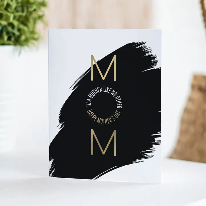 Black and gold Mother's Day greeting card with bold brushstroke design from Parte Haus party supply store in Bethesda MD