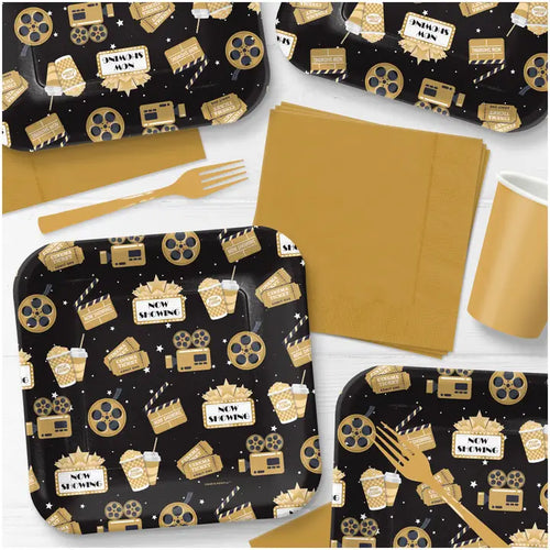 Black and gold movie theme dinner plate with film reels stars popcorn from Parte Haus party supply store in Bethesda MD