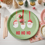 Multicolored Christmas dinner plate with Santa faces and ho ho ho from Parte Haus party supply store in Bethesda Maryland