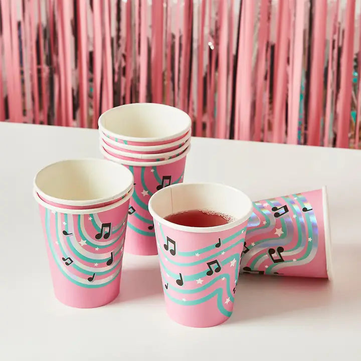 Pink musical notes paper cups with colorful swirls for birthday from Parte Haus party supply store in Bethesda MD
