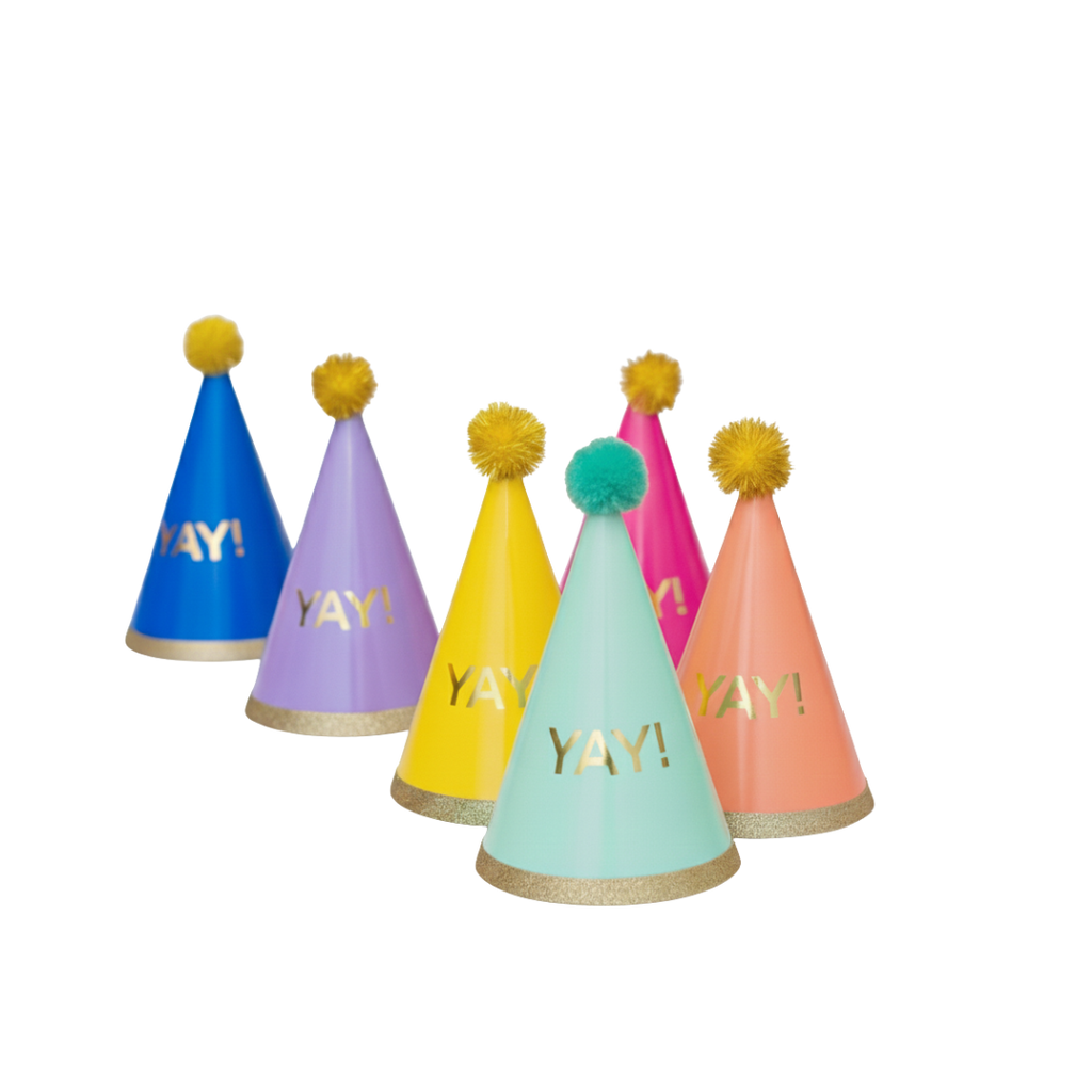 Colorful cone birthday hats with pom poms celebration theme from Parte Haus party supply store in Bethesda MD