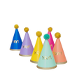 Colorful cone birthday hats with pom poms celebration theme from Parte Haus party supply store in Bethesda MD