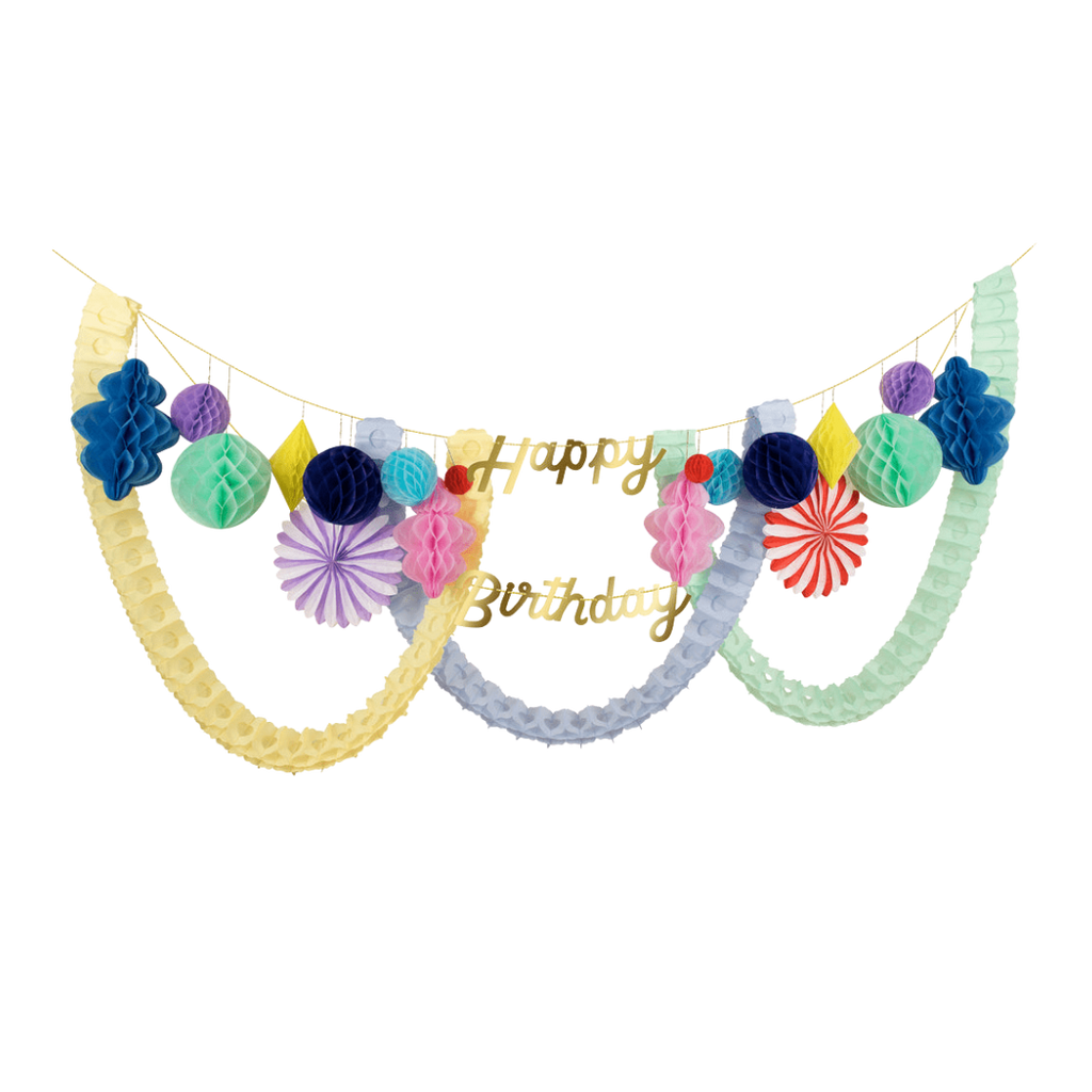 Multicolor birthday banner with honeycomb decorations for birthday theme from Parte Haus party supply store in Bethesda Maryland