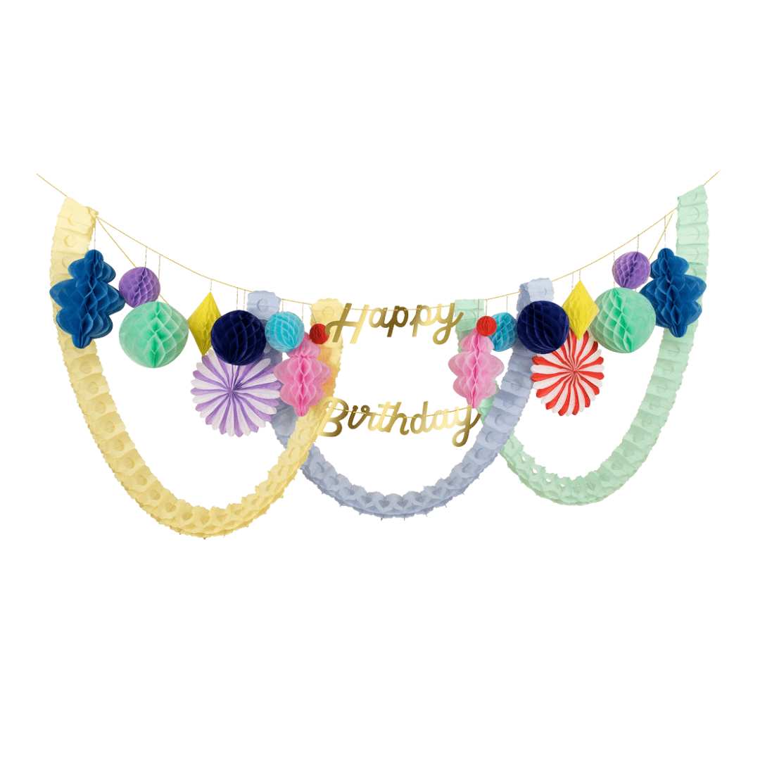 Multicolor birthday banner with honeycomb decorations for birthday theme from Parte Haus party supply store in Bethesda Maryland