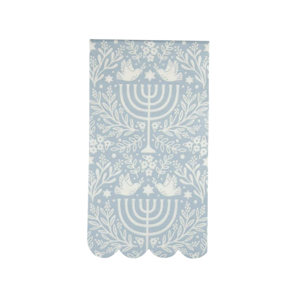 Blue and white paper napkin with menorah and dove design Hanukkah theme from Parte Haus party supply store in Bethesda MD