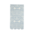 Blue and white paper napkin with menorah and dove design Hanukkah theme from Parte Haus party supply store in Bethesda MD