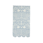 Blue and white paper napkin with menorah and dove design Hanukkah theme from Parte Haus party supply store in Bethesda MD
