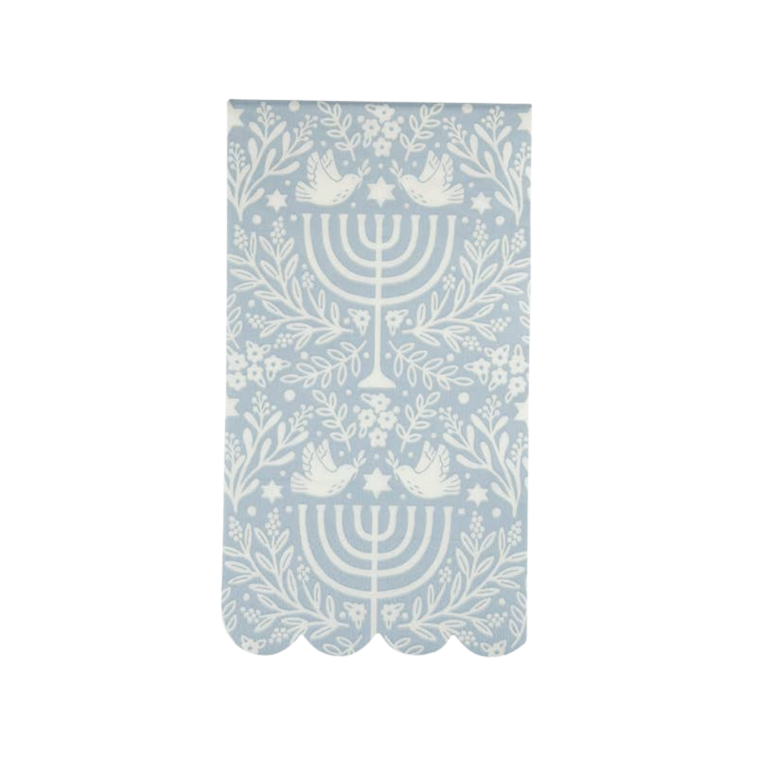 Blue and white paper napkin with menorah and dove design Hanukkah theme from Parte Haus party supply store in Bethesda MD