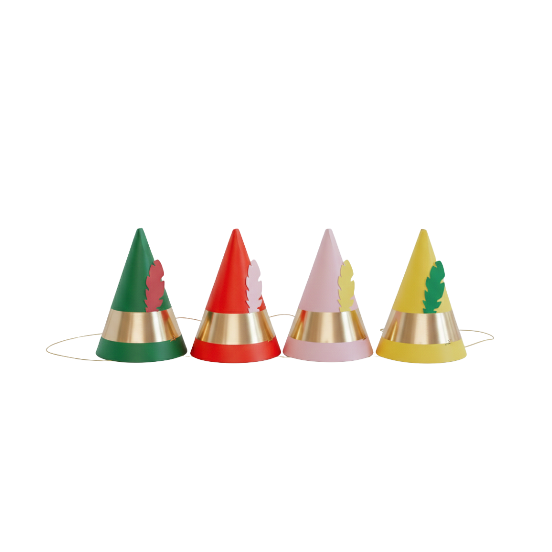 Green red pink yellow cone hats with gold band birthday theme from Parte Haus party supply store in Bethesda MD