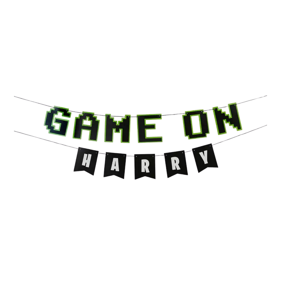 Green and black gamer banner with block letters game on theme from Parte Haus party supply store in Bethesda Maryland