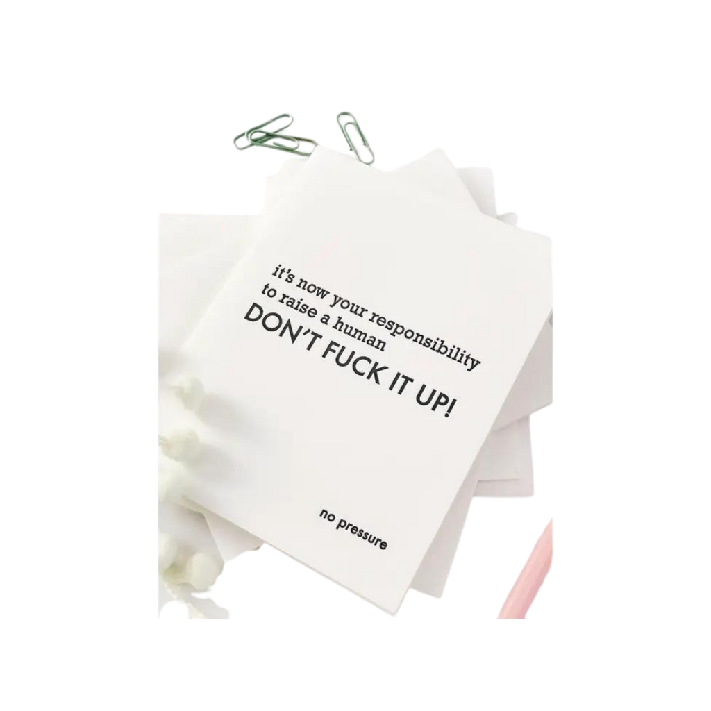 White letterpress congratulations card with humorous black text new baby theme from Parte Haus party supply store in Bethesda Maryland
