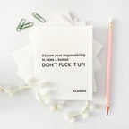 White letterpress new baby congrats card with playful message for parents from Parte Haus party supply store in Bethesda MD