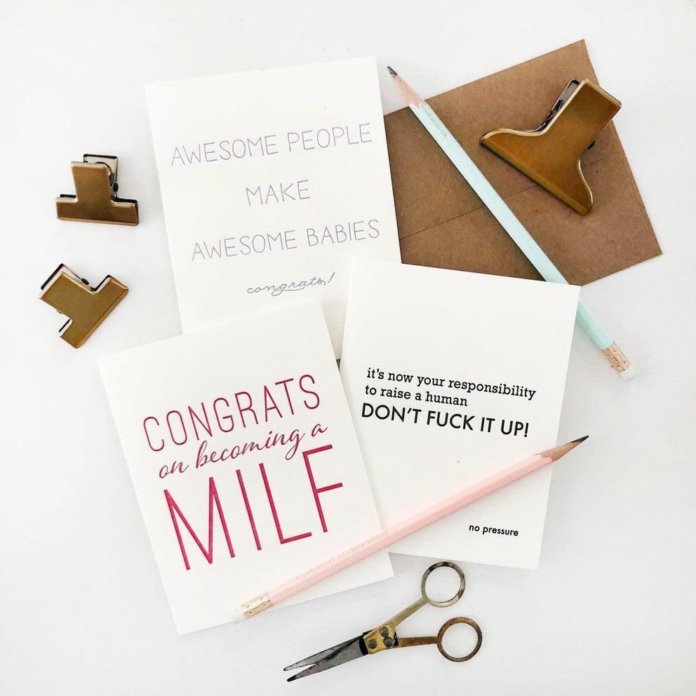 White funny letterpress new baby parent congrats cards with gold clips and pencils baby shower theme from Parte Haus party supply store in Bethesda MD