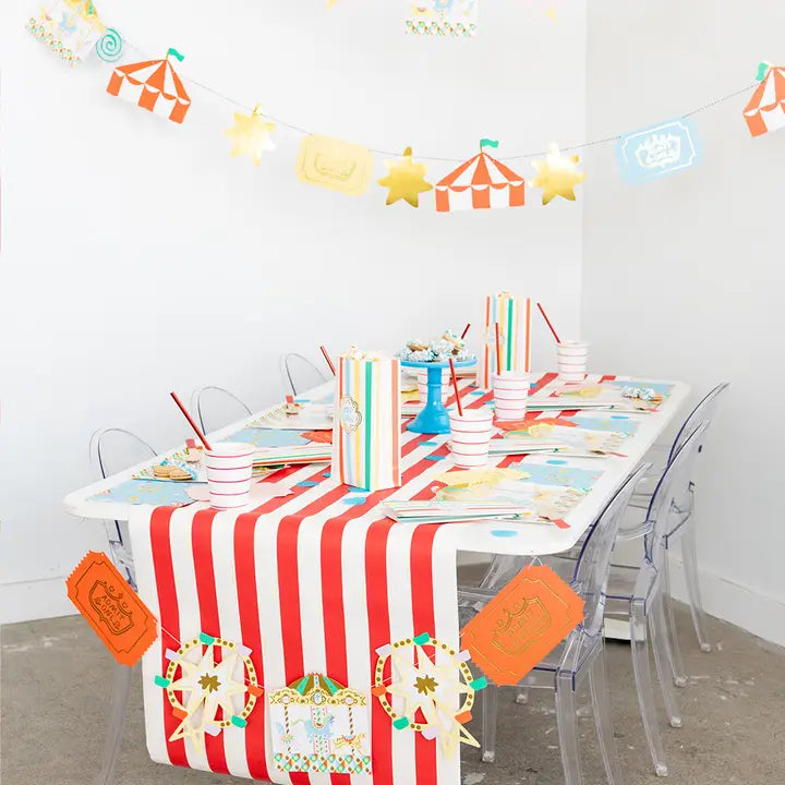 Red and white circus themed large plates on a decorated birthday table from Parte Haus party supply store in Bethesda MD