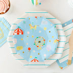 Light blue small plates with carousel and carnival illustrations for fair theme from Parte Haus party supply store in Bethesda MD