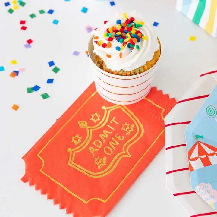 Red Admit One napkins with gold lettering carnival theme from Parte Haus party supply store in Bethesda MD