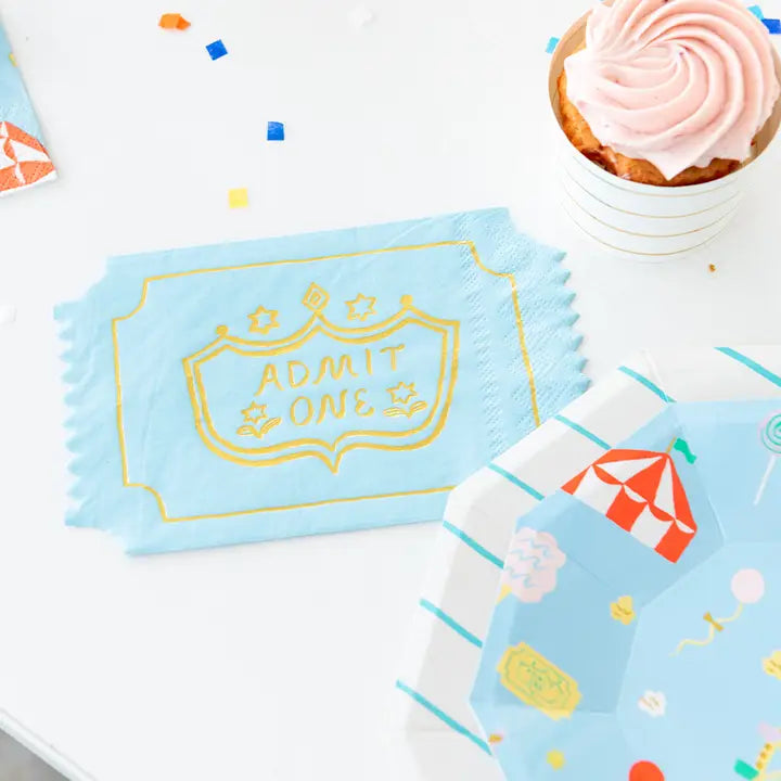 Light blue admit one napkin with gold fair ticket design carnival theme from Parte Haus party supply store in Bethesda MD.