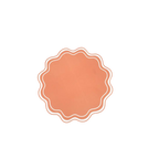 Orange wavy scallop paper placemat with white trim for celebrations from Parte Haus party supply store in Bethesda MD