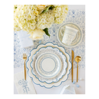 Blue and white floral paper plates with gold cutlery spring table setting from Parte Haus party supply store in Bethesda MD