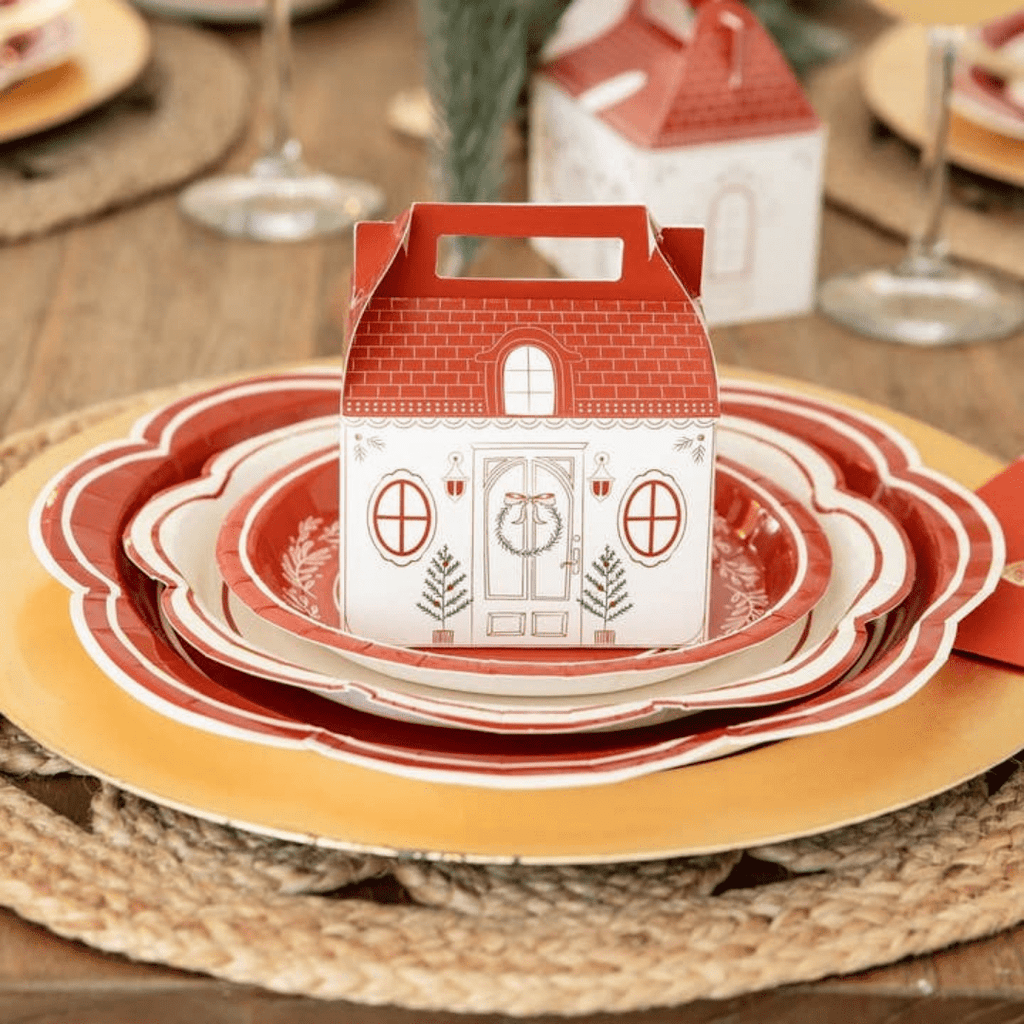 Red and white house gift box centerpiece on scalloped plates Christmas from Parte Haus party supply store in Bethesda Maryland