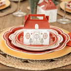 Red and white house gift box centerpiece on scalloped plates Christmas from Parte Haus party supply store in Bethesda Maryland