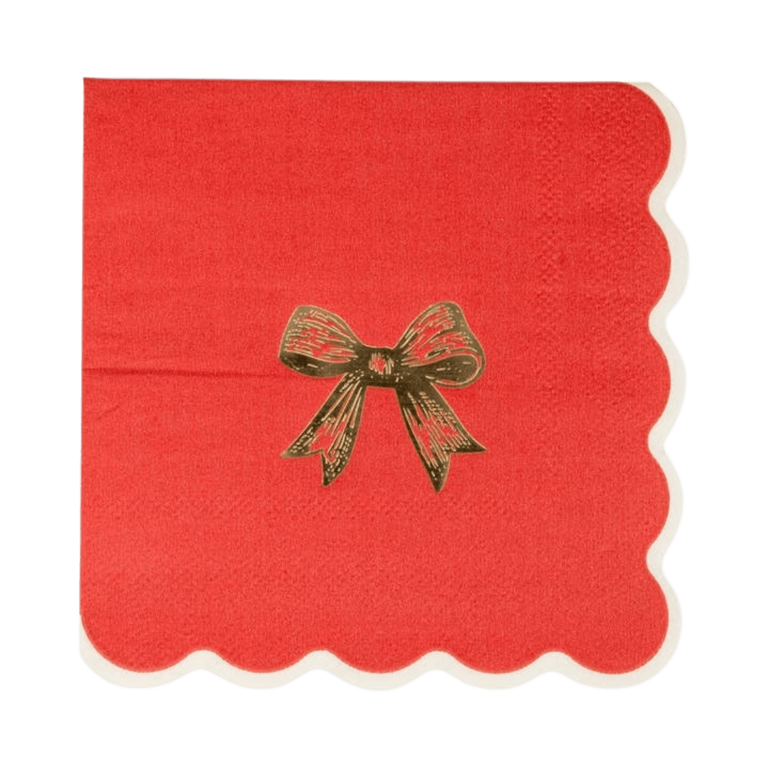 Red napkin with gold bow and scalloped edge Christmas theme from Parte Haus party supply store in Bethesda MD