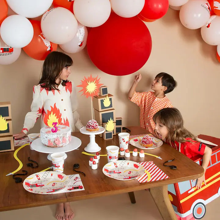 Red and white firefighter themed plates and tableware for kids birthday from Parte Haus party supply store in Bethesda Maryland