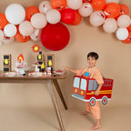 Red and orange firefighter party plates with firetruck design kids birthday theme from Parte Haus party supply store in Bethesda Maryland
