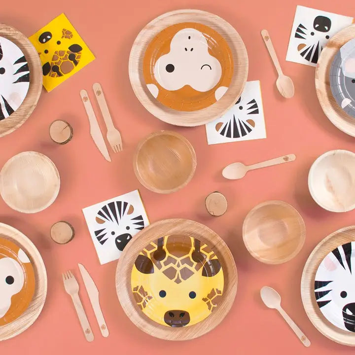 Yellow and brown safari animal plates with wooden cutlery for kids birthday from Parte Haus party supply store in Bethesda MD