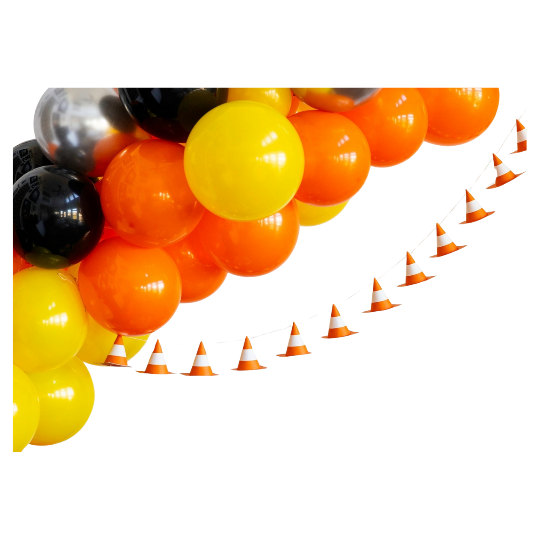 Orange yellow and black balloon garland with mini traffic cone banner construction theme from Parte Haus party supply store in Bethesda Maryland