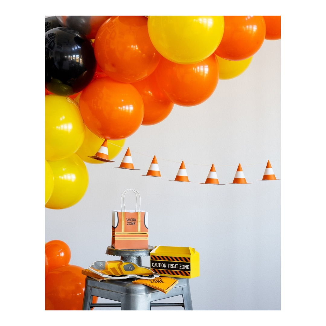 Orange and yellow construction themed decoration set with balloons and cones for birthday from Parte Haus party supply store in Bethesda Maryland