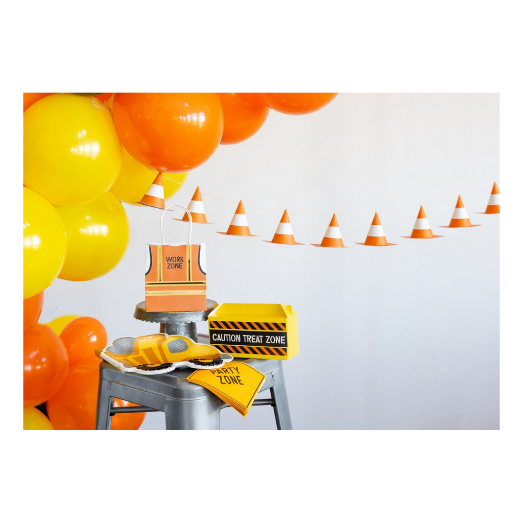 Yellow and orange construction themed decorations with balloons and cones for kids birthday party from Parte Haus party supply store in Bethesda MD.