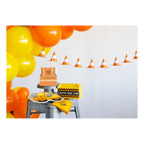Yellow and orange construction themed decorations with balloons and cones for kids birthday party from Parte Haus party supply store in Bethesda MD.