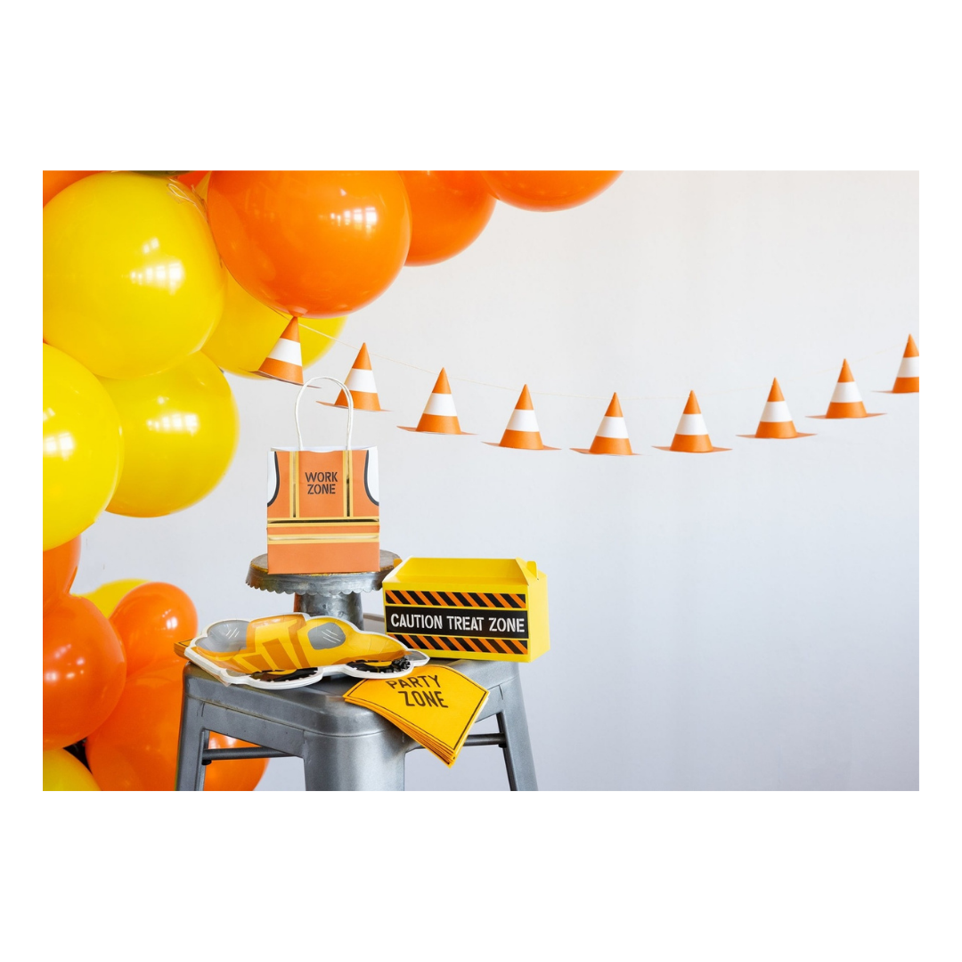 Yellow and orange construction themed decorations with balloons and cones for kids birthday party from Parte Haus party supply store in Bethesda MD.