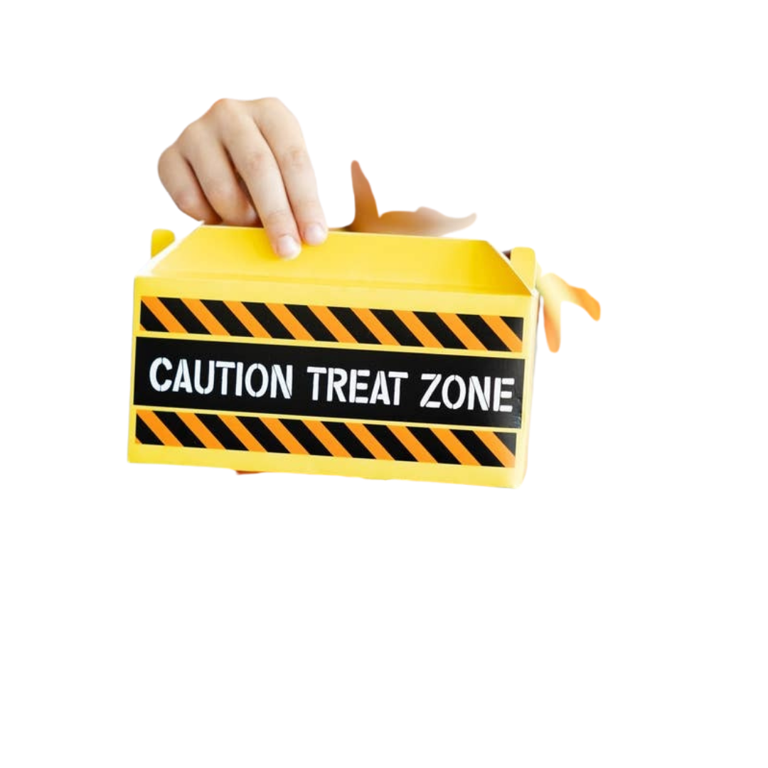 Yellow caution treat zone treat box with black stripes for birthday construction theme from Parte Haus party supply store in Bethesda MD