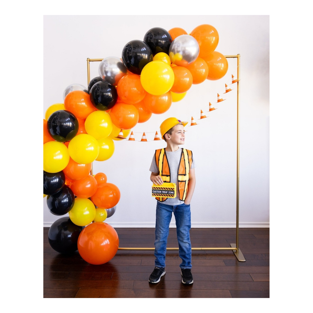 Orange yellow and black construction balloon arch with construction theme from Parte Haus party supply store in Bethesda Maryland