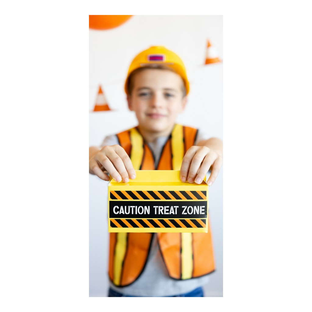 orange construction costume with caution treat zone sign kids birthday theme from Parte Haus party supply store in Bethesda MD