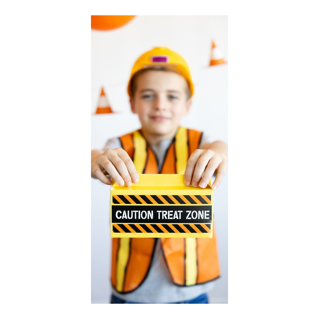 orange construction costume with caution treat zone sign kids birthday theme from Parte Haus party supply store in Bethesda MD