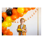 orange and yellow construction theme balloon arch kid in vest and hard hat birthday from Parte Haus party supply store in Bethesda MD