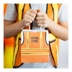 Orange construction goodie bag with work zone sign for kids birthday from Parte Haus party supply store in Bethesda MD