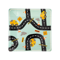 Yellow construction truck plate with road and sign graphics construction birthday from Parte Haus party supply store in Bethesda Maryland