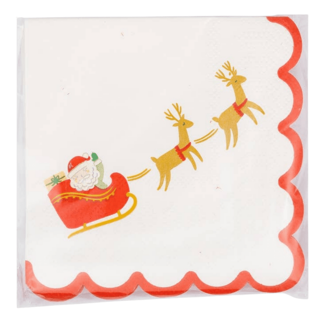red white Christmas napkin with Santa sleigh and reindeer design for holiday parties from Parte Haus party supply store in Bethesda Maryland