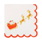 White red Christmas napkin with scalloped edge Santa in sleigh and reindeer from Parte Haus party supply store in Bethesda Maryland