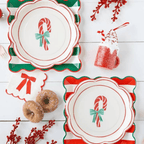 Red and green Christmas plates with candy cane design holiday table decor from Parte Haus party supply store in Bethesda MD