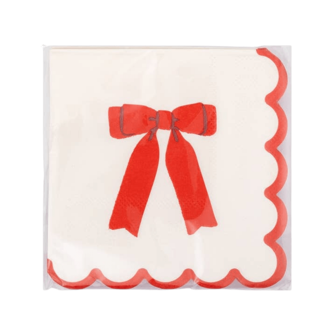 Red bow paper napkin with scalloped edges for birthday from Parte Haus party supply store in Bethesda MD.